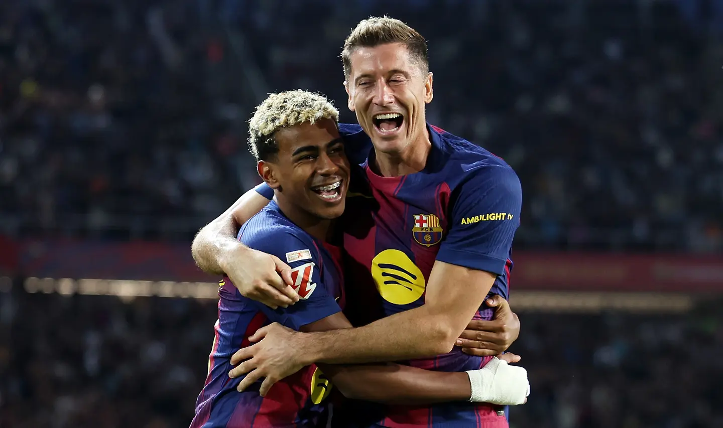 Ламин Ямал и Роберт Левандовски / Getty Images