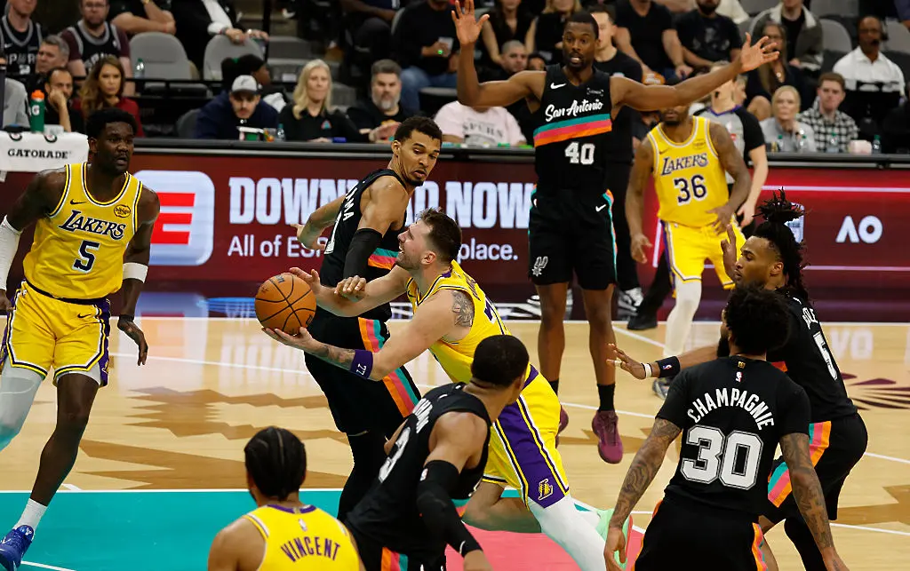 Лука Дончич и Виктор Уембаняма / Getty Images 