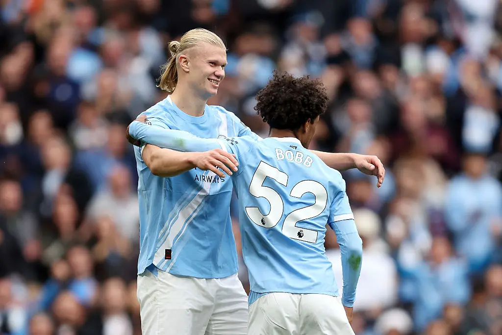 Ерлинг Холанд и Оскар Боб / Getty Images 