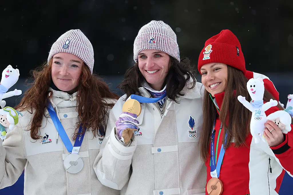 Лора Христова на подиума с Жулиа Симон и Лу Жанмоно / Getty Images 