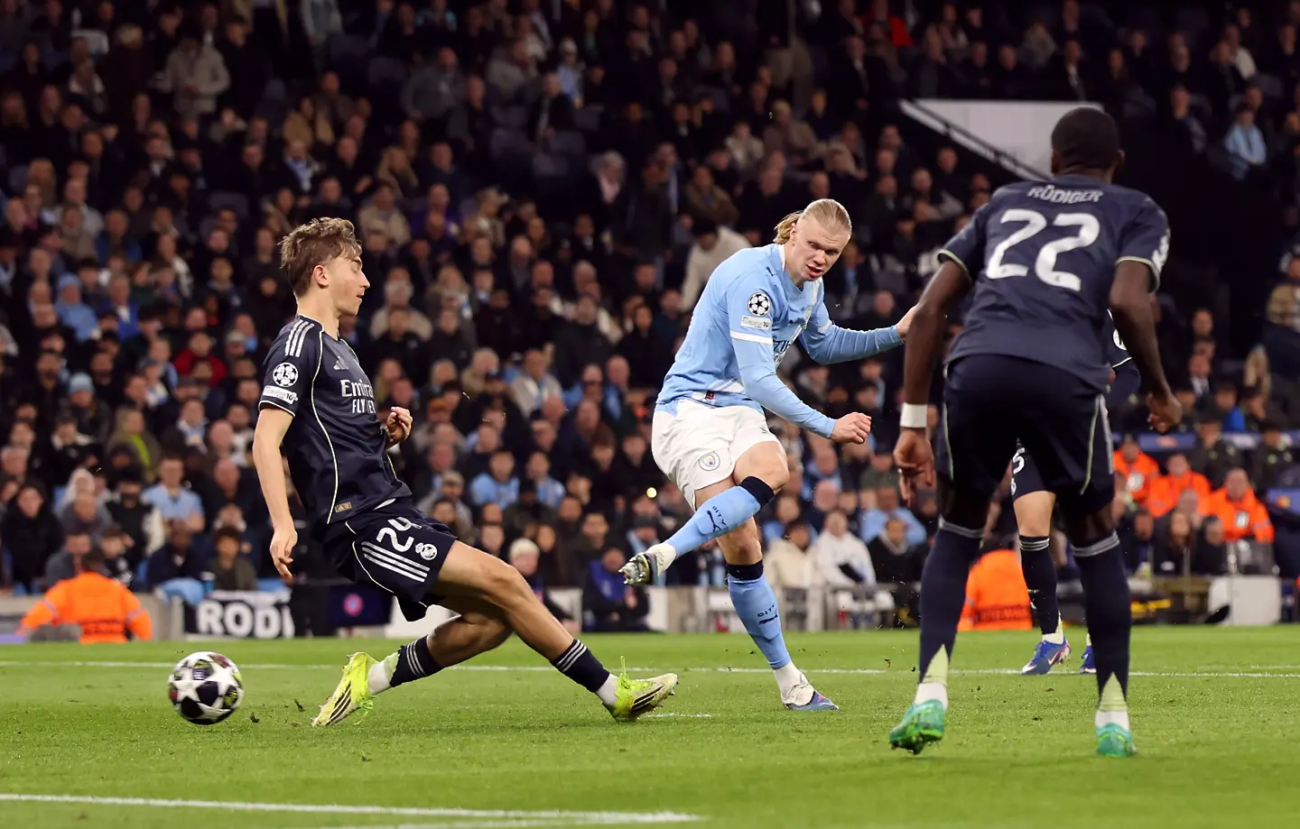 Дийн Хаусен, Ерлинг Холанд, Антонио Рюдигер / Getty Images