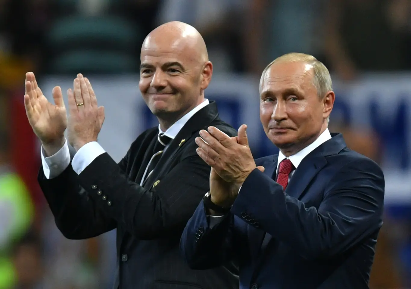Джани Инфантино и Владимир Путин / Getty Images